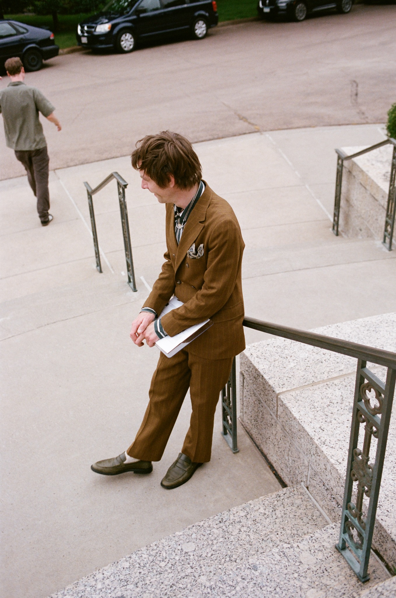 Event participant standing on the chapel steps
